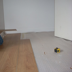 Square pose de parquets sur isolation